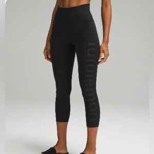 Black Lululemon high rise crop 23” graphic leggings sz. 6
